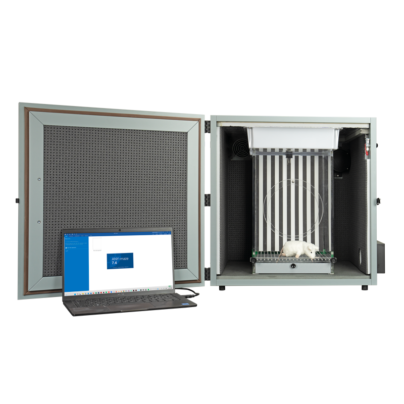 Fear Conditioning System. Cubicle front view with door open and animal cage with checkerboard contexts mounted